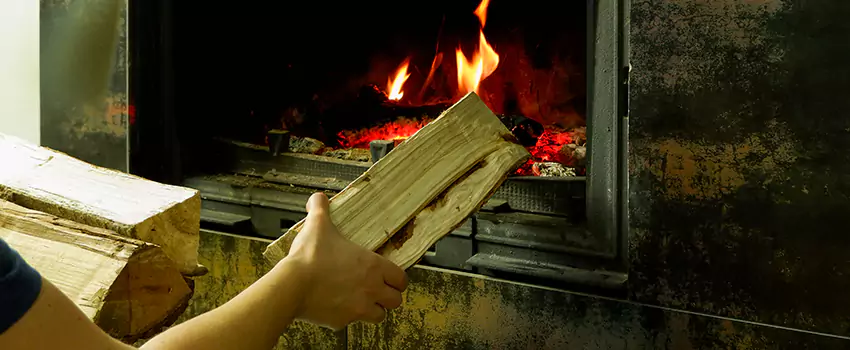 Wood Stove Heat Resistant Wall Repair in Sainte Therese, Quebec